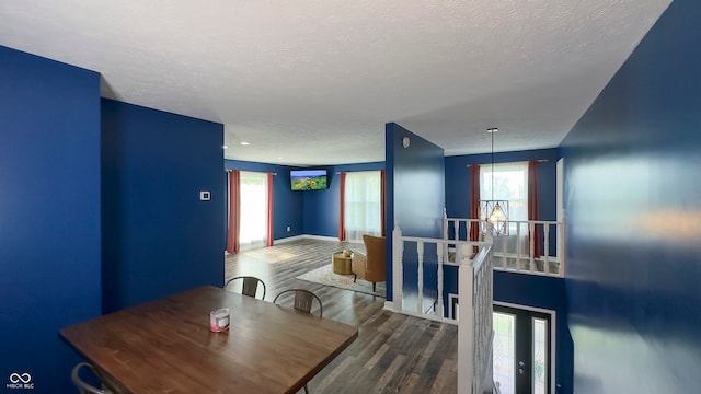 80 E College Ave, Martinsville, IN 46151 - dining area with a textured ceiling, wood finished floors, and baseboards