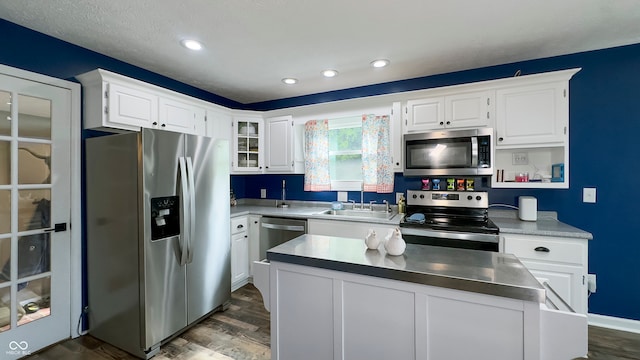 80 E College Ave, Martinsville, IN 46151 - kitchen with stainless steel appliances, a sink, dark wood-style floors, white cabinets, and recessed lighting