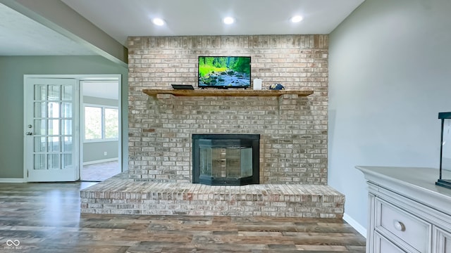 80 E College Ave, Martinsville, IN 46151 - living area featuring wood finished floors, baseboards, a brick fireplace, and recessed lighting