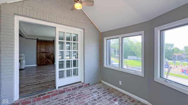 80 E College Ave, Martinsville, IN 46151 - unfurnished sunroom with vaulted ceiling and a barn door