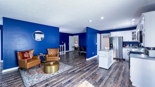 80 E College Ave, Martinsville, IN 46151 - kitchen featuring stainless steel fridge with ice dispenser, dark wood-type flooring, white cabinetry, baseboards, and a textured ceiling