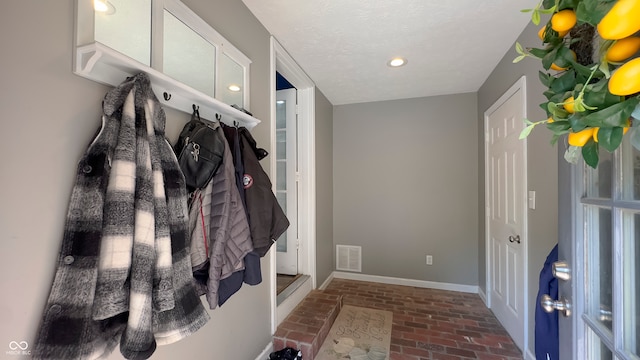 80 E College Ave, Martinsville, IN 46151 - mudroom with brick flooring, baseboards, and recessed lighting