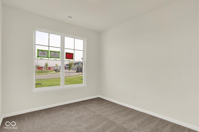 104 Maxim Ct, Cumberland, IN 46229 - carpeted spare room with baseboards