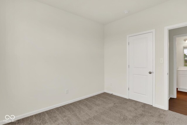 104 Maxim Ct, Cumberland, IN 46229 - unfurnished bedroom featuring carpet floors and baseboards
