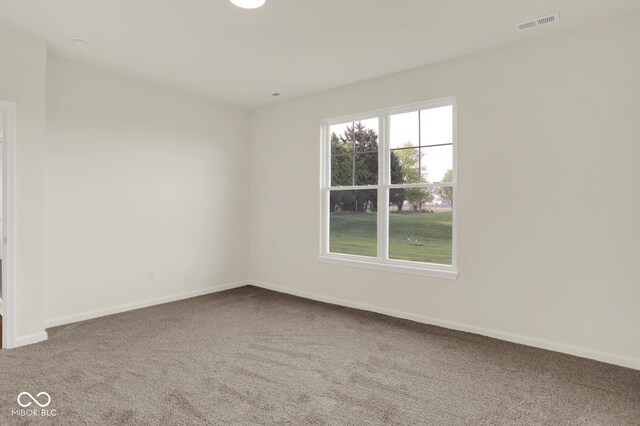 104 Maxim Ct, Cumberland, IN 46229 - carpeted spare room featuring baseboards