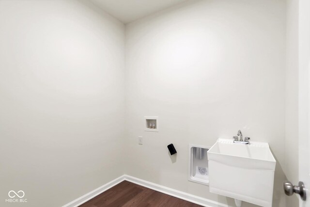 104 Maxim Ct, Cumberland, IN 46229 - laundry room with dark wood-style flooring, baseboards, and hookup for a washing machine