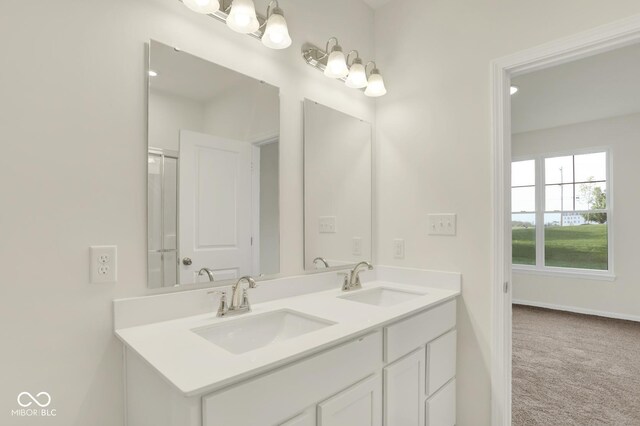 104 Maxim Ct, Cumberland, IN 46229 - full bathroom featuring double vanity and baseboards