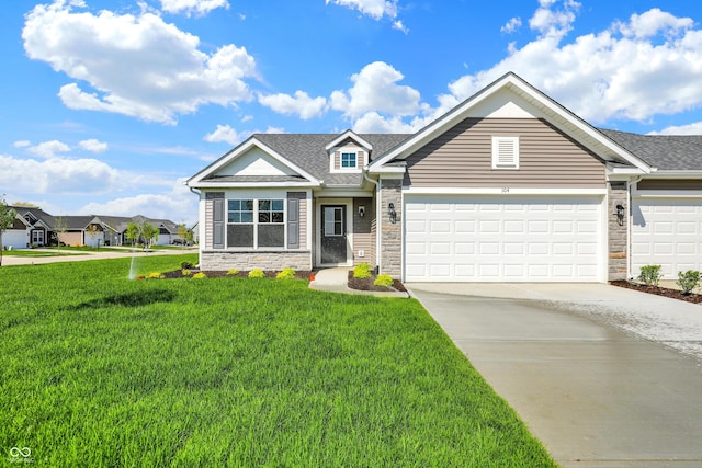 104 Maxim Ct, Cumberland, IN 46229 - view of front of house featuring stone siding, concrete driveway, a front lawn, a garage, and roof with shingles