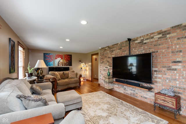 1541 Stadium Dr, Seymour, IN 47274 - living area featuring wood finished floors, recessed lighting, and baseboards
