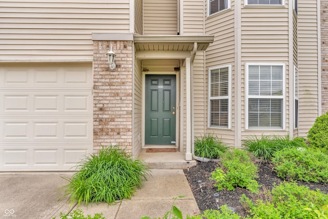 1139 Fernwood Way, Plainfield, IN 46168 - entrance to property featuring brick siding and a garage