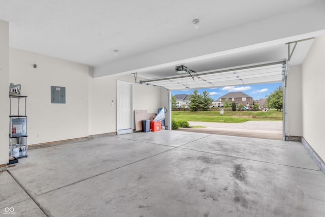 1139 Fernwood Way, Plainfield, IN 46168 - garage with electric panel, a garage door opener, and baseboards