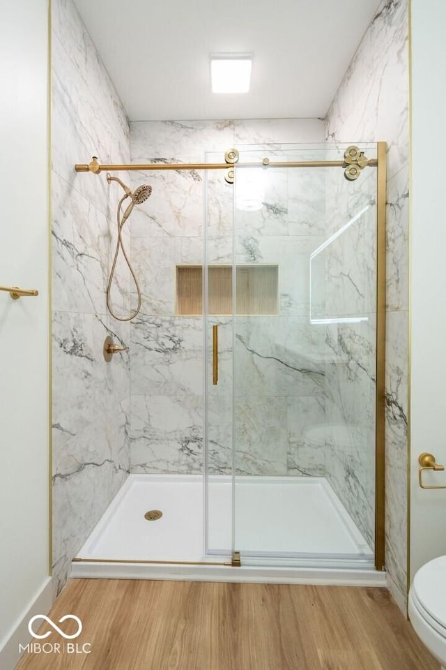 4251 Coventry Dr, Kokomo, IN 46902 - bathroom featuring a marble finish shower, toilet, and wood finished floors