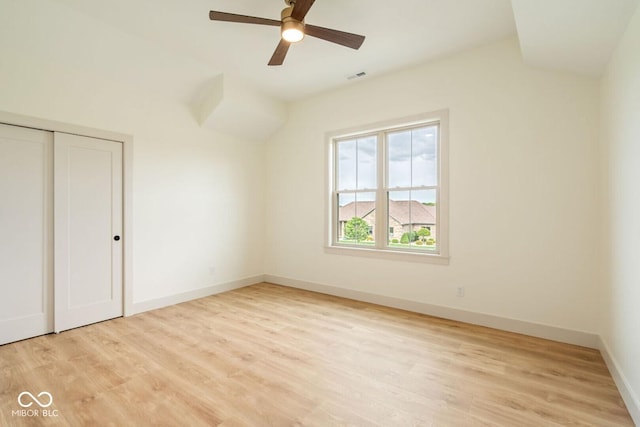 4251 Coventry Dr, Kokomo, IN 46902 - unfurnished bedroom with light wood-style flooring, baseboards, a closet, and a ceiling fan