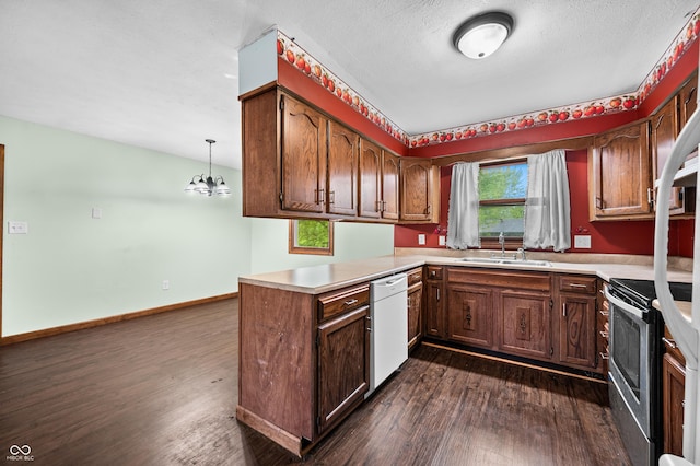 201 Hayden Pike, North Vernon, IN 47265 - kitchen featuring a sink, dishwasher, electric stove, dark wood-type flooring, and a peninsula