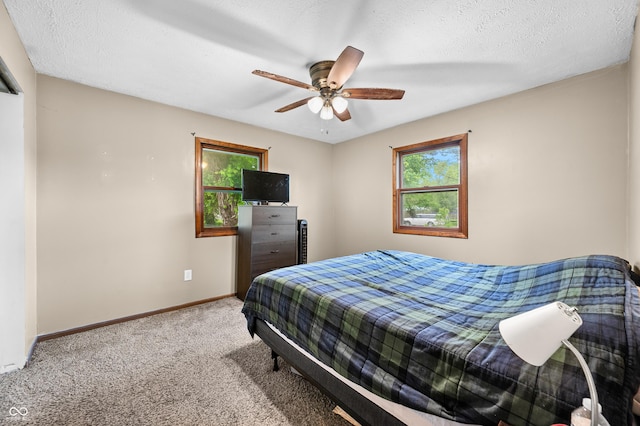 201 Hayden Pike, North Vernon, IN 47265 - bedroom with carpet flooring, baseboards, and ceiling fan