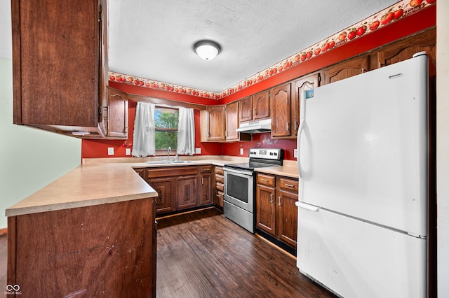 201 Hayden Pike, North Vernon, IN 47265 - kitchen with freestanding refrigerator, electric stove, a sink, dark wood-type flooring, and a textured ceiling