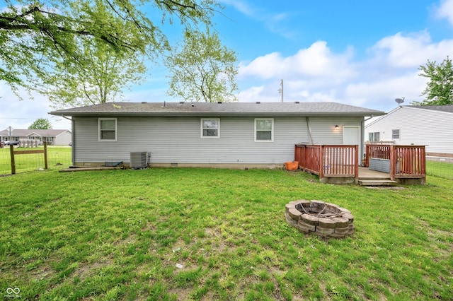 201 Hayden Pike, North Vernon, IN 47265 - rear view of property featuring a fire pit, a deck, central air condition unit, and crawl space