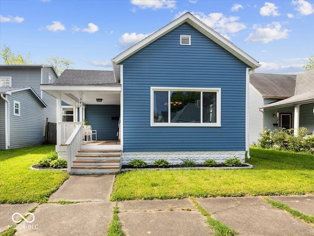 547 W Taylor St, Shelbyville, IN 46176 - view of front of home with a porch and a front lawn
