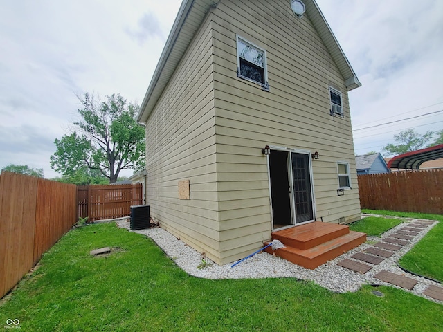 704 E Perry St, Indianapolis, IN 46227 - rear view of property with central AC unit