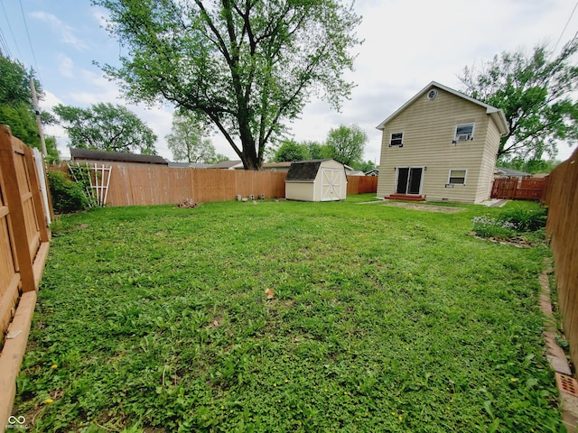 704 E Perry St, Indianapolis, IN 46227 - view of yard featuring a shed and an outbuilding