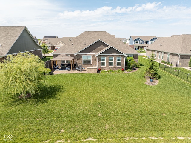 4659 W Otway Ln, New Palestine, IN 46163 - rear view of house featuring a gazebo, a patio area, brick siding, and a residential view