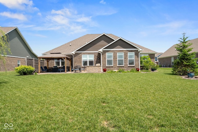 4659 W Otway Ln, New Palestine, IN 46163 - rear view of house with a gazebo, a patio area, a yard, and brick siding