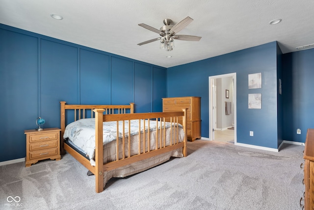 4659 W Otway Ln, New Palestine, IN 46163 - bedroom featuring carpet floors, a decorative wall, baseboards, recessed lighting, and ensuite bath