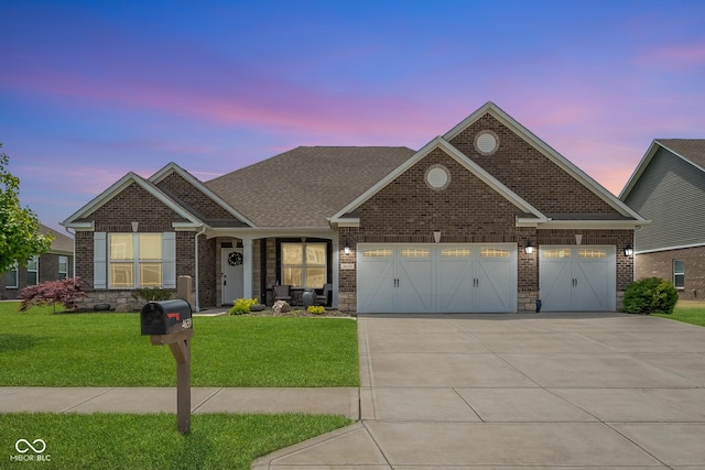 4659 W Otway Ln, New Palestine, IN 46163 - view of front of house with a garage, driveway, brick siding, and a front yard