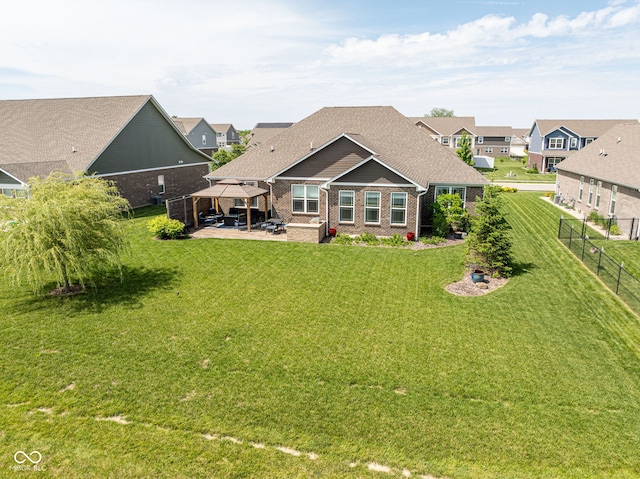 4659 W Otway Ln, New Palestine, IN 46163 - back of property featuring a gazebo, a patio area, brick siding, and a residential view