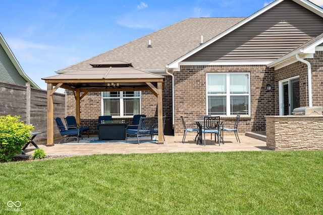4659 W Otway Ln, New Palestine, IN 46163 - back of property with brick siding, a gazebo, a patio, and a shingled roof