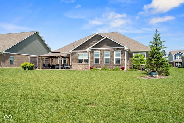 4659 W Otway Ln, New Palestine, IN 46163 - rear view of property featuring a gazebo, brick siding, a lawn, and a patio area