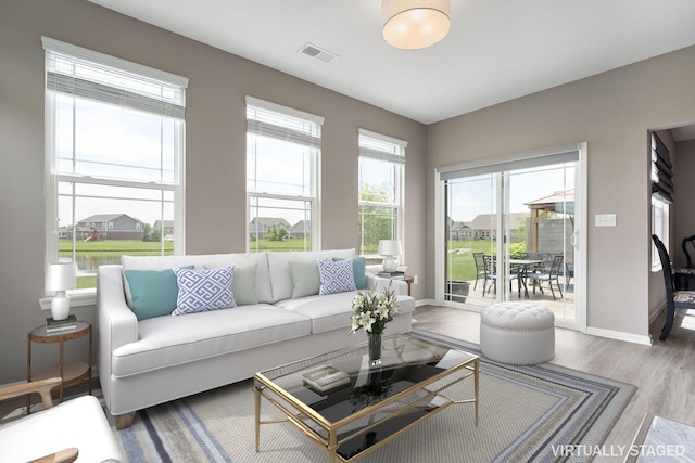4659 W Otway Ln, New Palestine, IN 46163 - living area featuring wood finished floors and baseboards