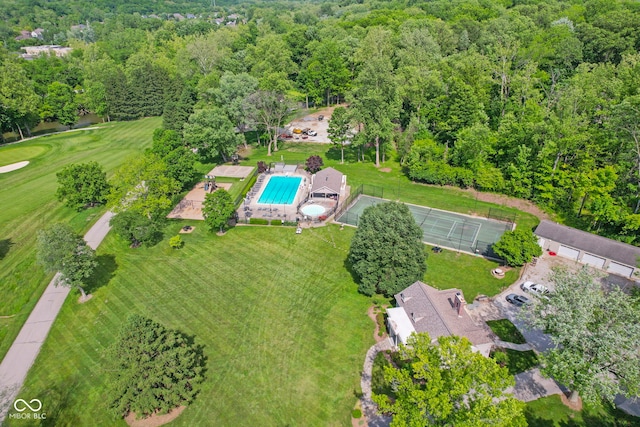 6230 E 56th St, Indianapolis, IN 46226 - aerial view of a pool and a heavily wooded area