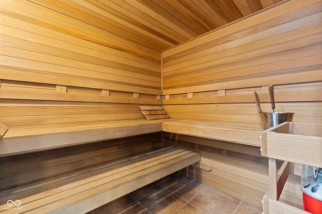 6230 E 56th St, Indianapolis, IN 46226 - sauna / steam room featuring tile patterned floors, wood ceiling, and wood walls