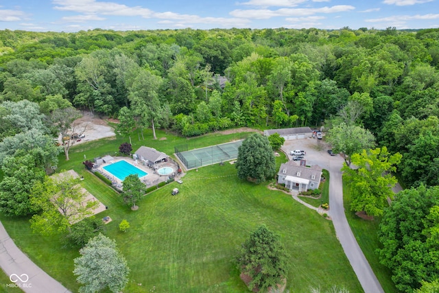 6230 E 56th St, Indianapolis, IN 46226 - aerial view of property's location with a pool and a heavily wooded area