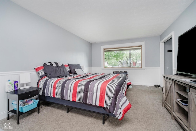 5236 Honey Comb Ln, Indianapolis, IN 46221 - bedroom with light colored carpet and wainscoting