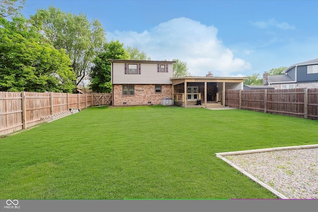 5236 Honey Comb Ln, Indianapolis, IN 46221 - back of property with a patio area, brick siding, and a chimney