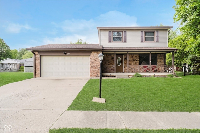 5236 Honey Comb Ln, Indianapolis, IN 46221 - traditional-style home with a garage, concrete driveway, a porch, and a front yard
