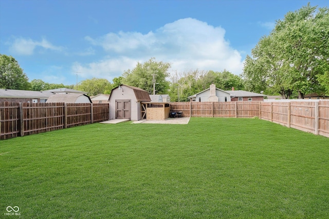 5236 Honey Comb Ln, Indianapolis, IN 46221 - view of yard featuring a storage shed and an outbuilding