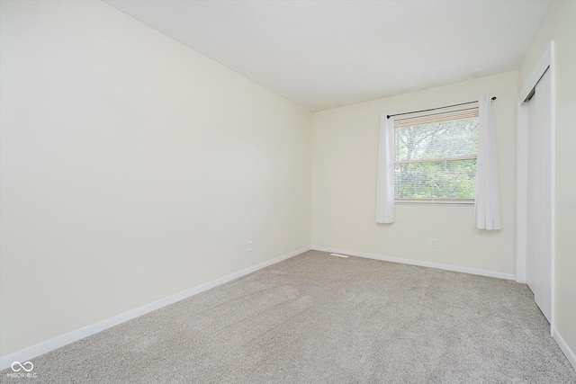 5236 Honey Comb Ln, Indianapolis, IN 46221 - carpeted empty room featuring baseboards