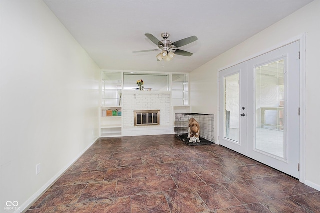 5236 Honey Comb Ln, Indianapolis, IN 46221 - living room featuring french doors, stone finish flooring, and baseboards