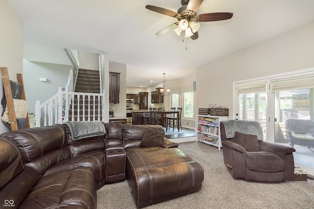 7430 Franklin Parke Woods, Indianapolis, IN 46259 - living area featuring carpet flooring, ceiling fan, and stairway