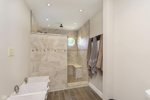 7430 Franklin Parke Woods, Indianapolis, IN 46259 - full bathroom featuring wood finish floors, a walk in shower, recessed lighting, baseboards, and toilet
