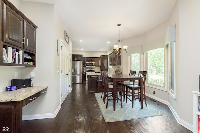 7430 Franklin Parke Woods, Indianapolis, IN 46259 - dining area featuring a chandelier, baseboards, dark wood-style flooring, and recessed lighting