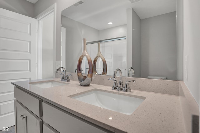 6683 Halsey St, Zionsville, IN 46077 - bathroom featuring a shower stall, double vanity, and recessed lighting