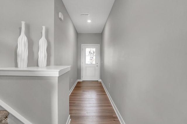 6683 Halsey St, Zionsville, IN 46077 - doorway with baseboards, wood finished floors, and recessed lighting