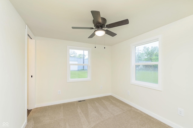 125 S Alfonte St, Ingalls, IN 46048 - carpeted empty room featuring baseboards and a ceiling fan