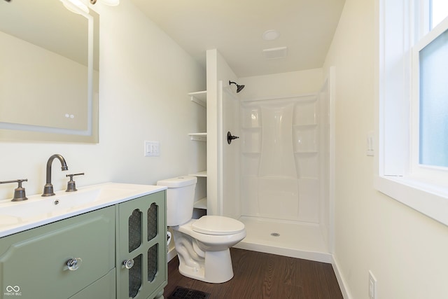 125 S Alfonte St, Ingalls, IN 46048 - full bath featuring toilet, wood finished floors, a shower, and vanity