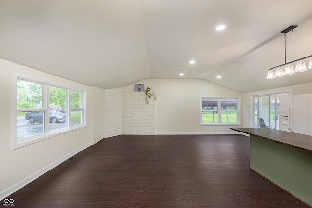 125 S Alfonte St, Ingalls, IN 46048 - unfurnished living room with lofted ceiling, dark wood finished floors, baseboards, and recessed lighting