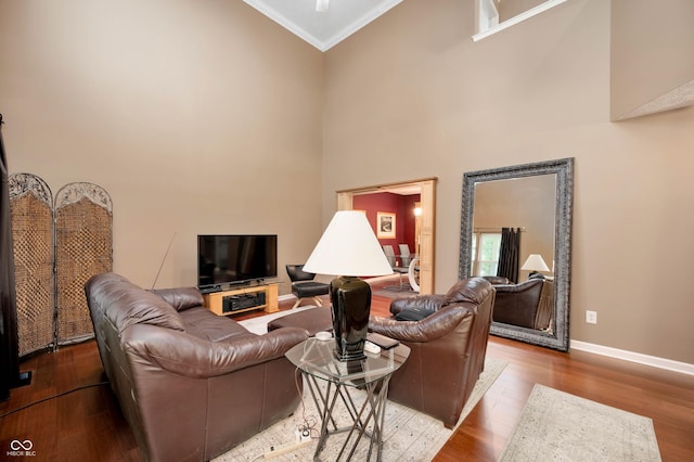 6026 Pennyworth Cir, Indianapolis, IN 46203 - living area featuring ornamental molding, wood finished floors, baseboards, and a high ceiling
